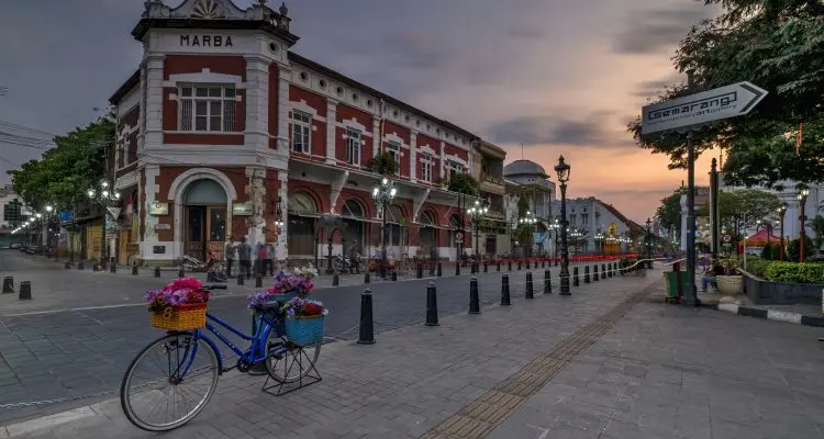 Kota Lama Semarang night lights and people celebrating New Year 2025